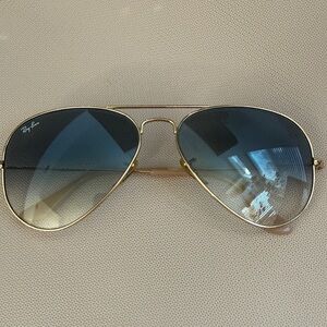 Ray-Ban Gold Frame Sunglasses with Blue Lenses
RB3025